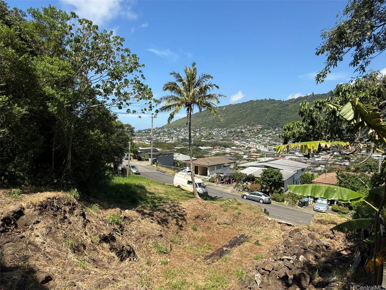 3059 Woolsey Place Honolulu, HI 96822 - Photo 17 of 18 a view of a town with trees in the background