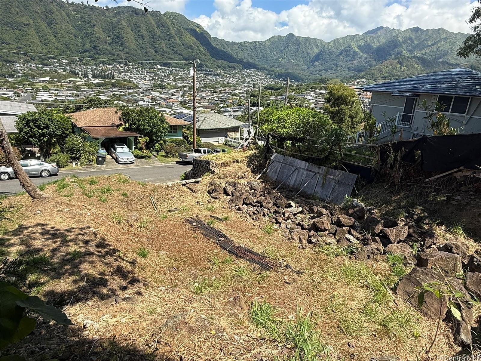 3059 Woolsey Place Honolulu, HI 96822 - Photo 9 of 18 a view of a lake with a mountain in the background
