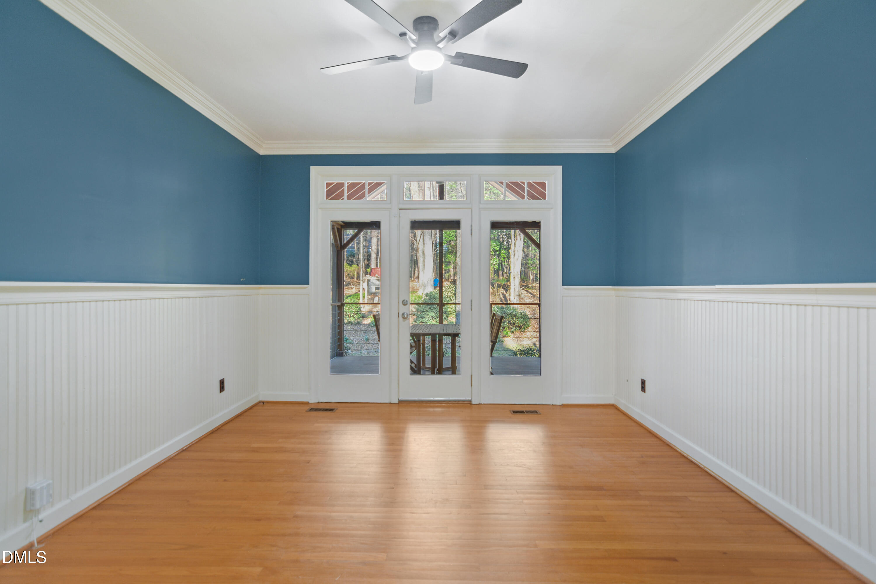 5008 Wood Valley Drive Raleigh, NC 27613 - Photo 12 of 37 wooden floor in an empty room with a window