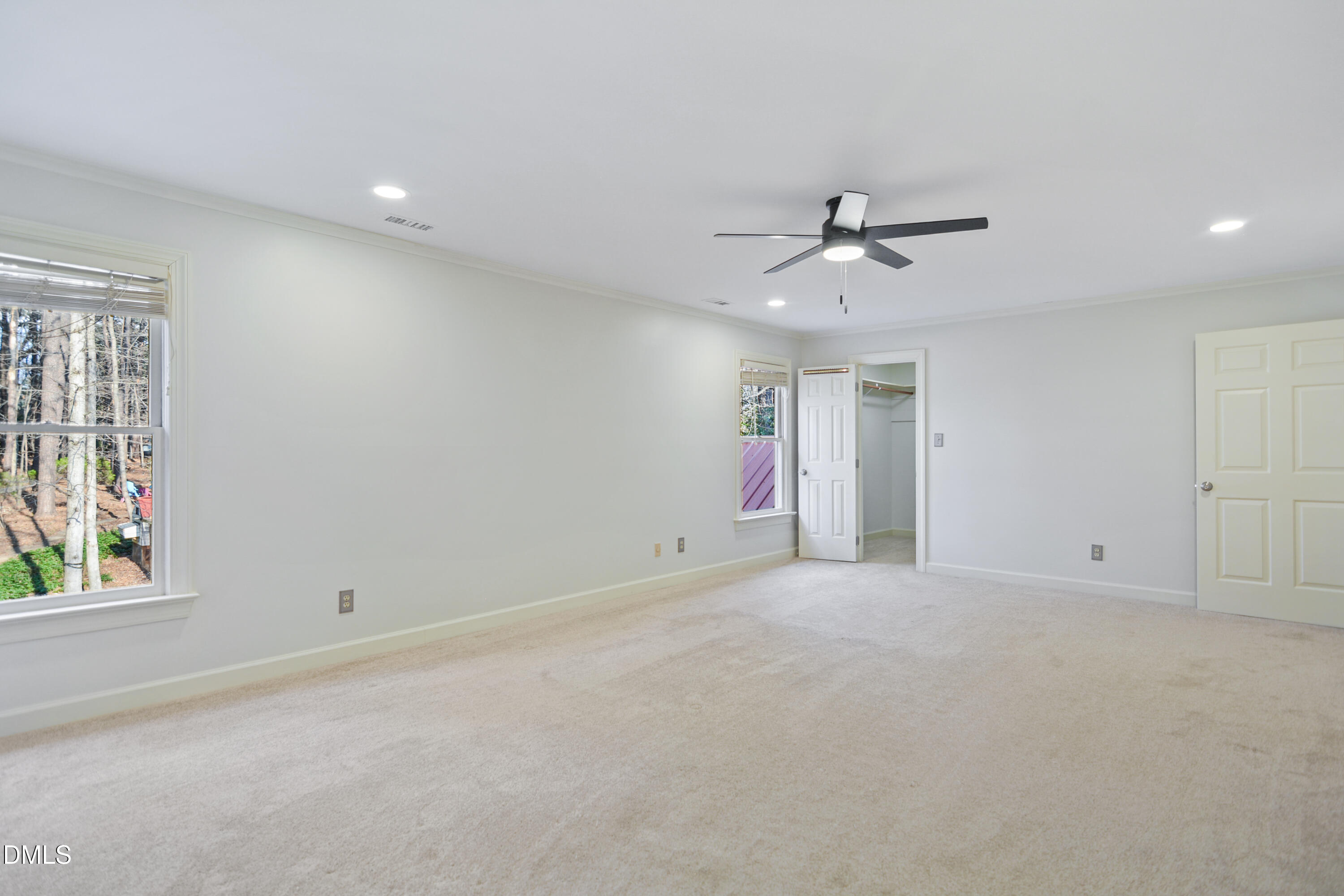 5008 Wood Valley Drive Raleigh, NC 27613 - Photo 15 of 37 a view of an empty room with a window