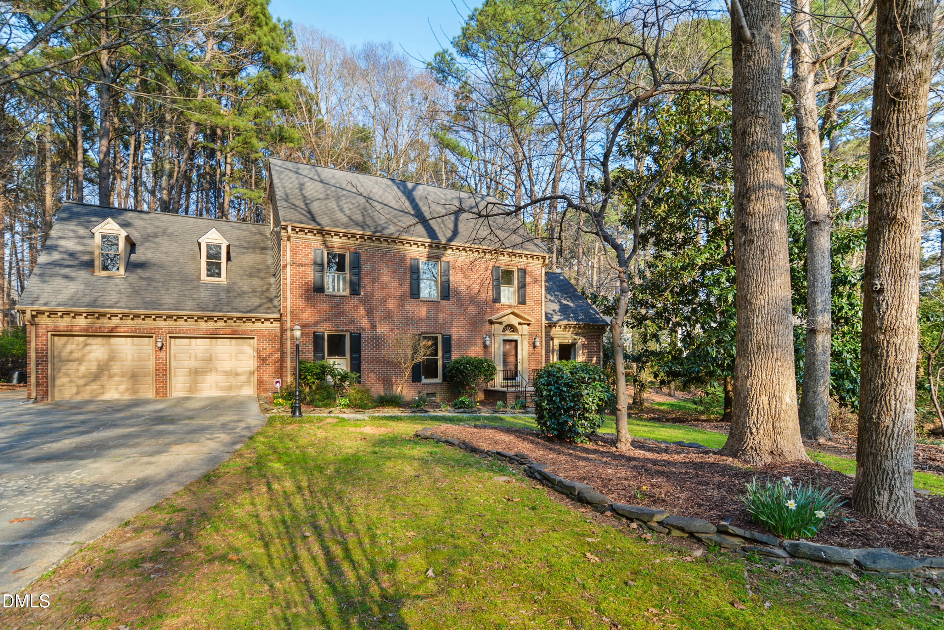 5008 Wood Valley Drive Raleigh, NC 27613 - Photo 2 of 37 a view of residential houses with yard and swimming pool