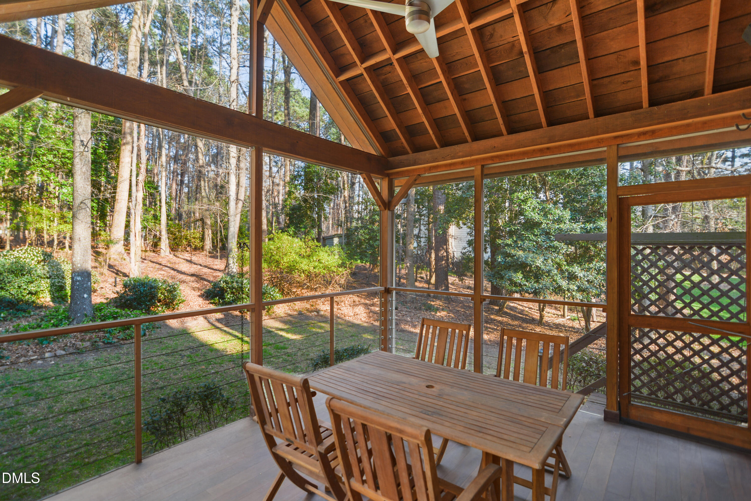 5008 Wood Valley Drive Raleigh, NC 27613 - Photo 30 of 37 a view of a chairs and table in the patio