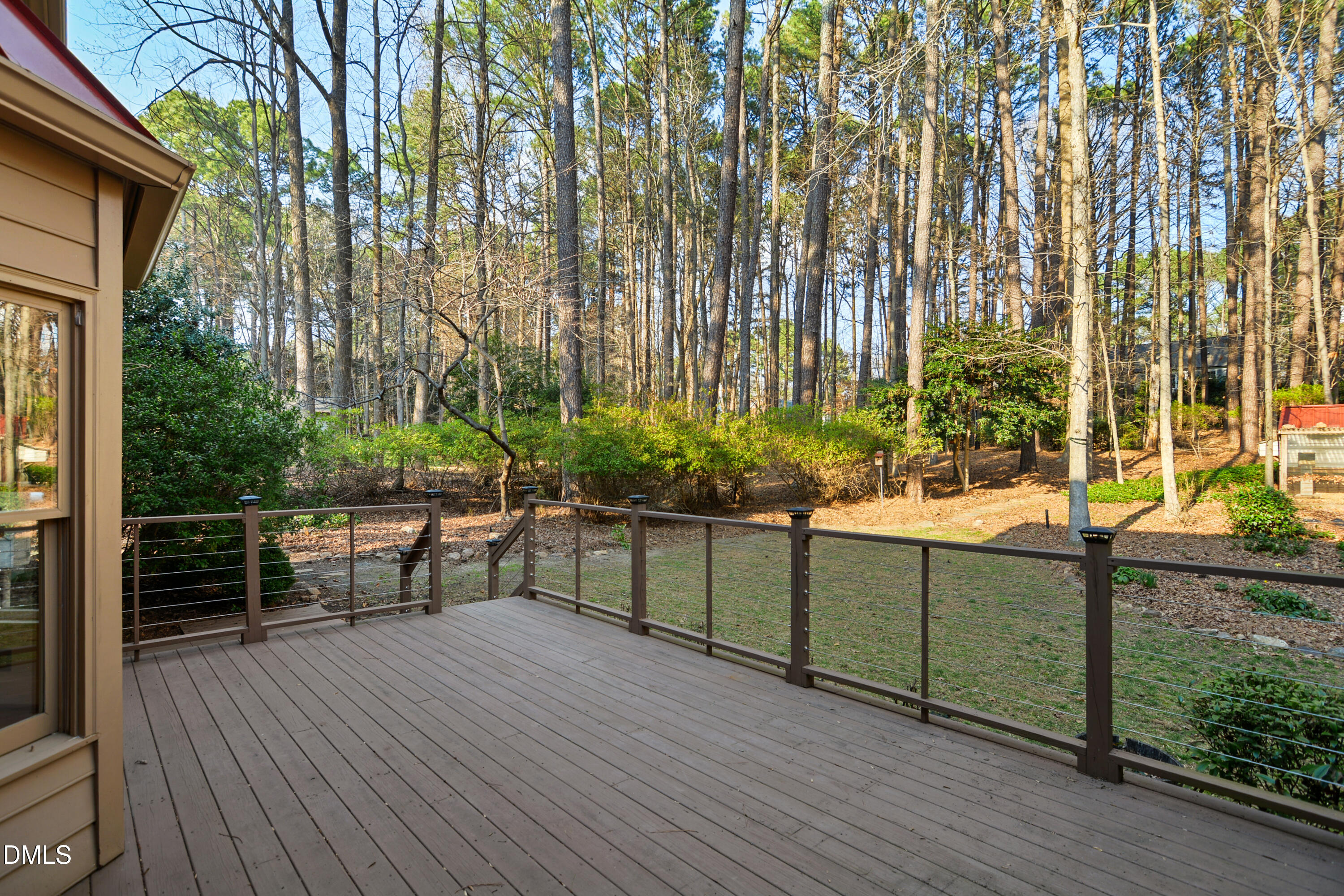 5008 Wood Valley Drive Raleigh, NC 27613 - Photo 31 of 37 a view of a terrace with sitting area
