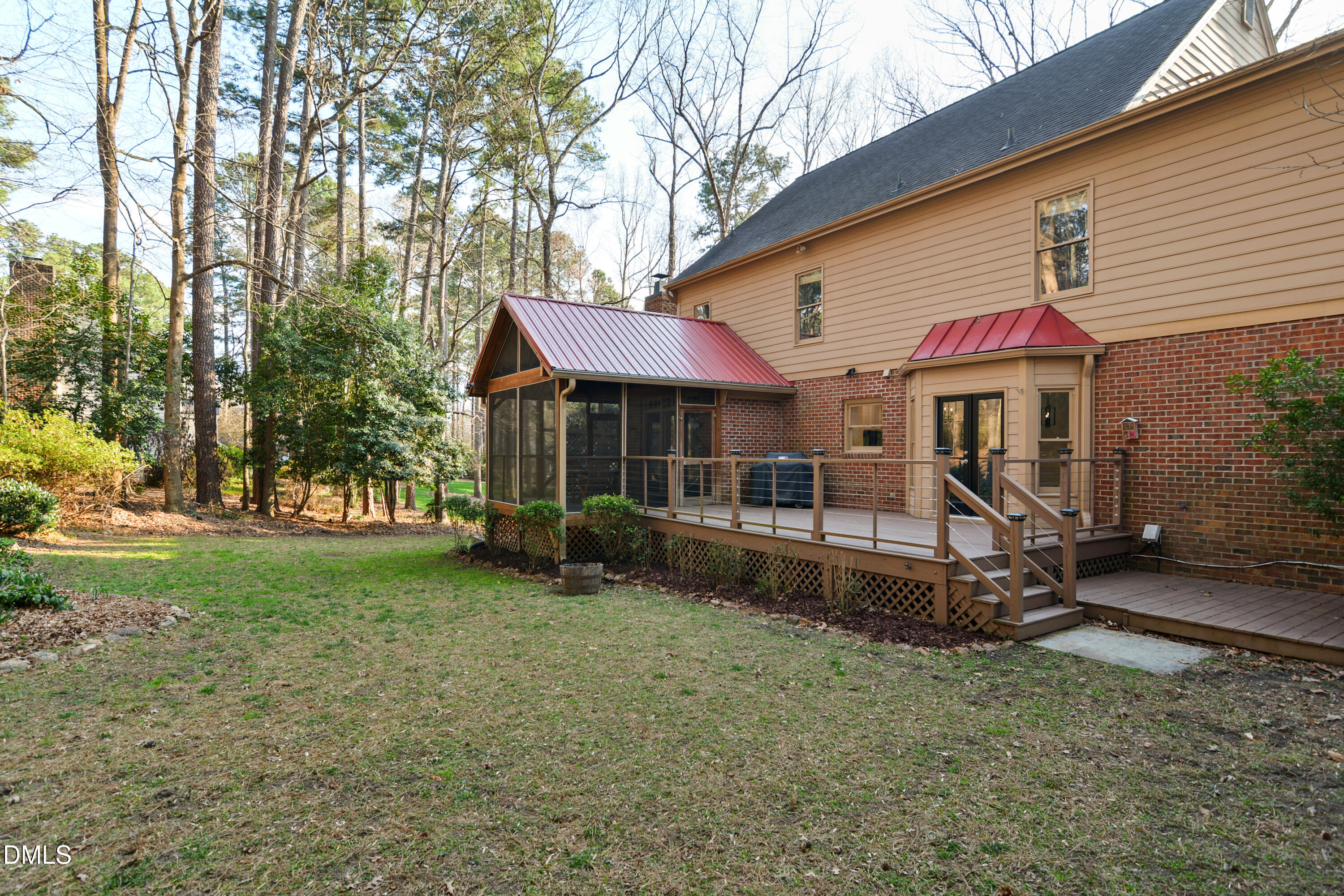 5008 Wood Valley Drive Raleigh, NC 27613 - Photo 33 of 37 a front view of a house with garden