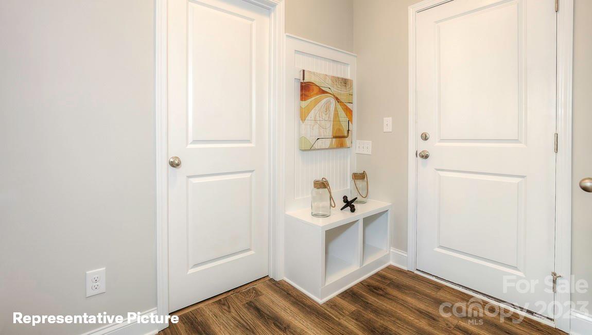 312 Streamwood Road Troutman, NC 28166 - Photo 14 of 39 a view of walk in closet with clothes and shoes
