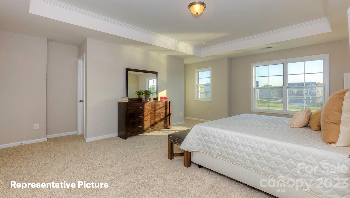 312 Streamwood Road Troutman, NC 28166 - Photo 27 of 39 a bedroom with a bed and a window
