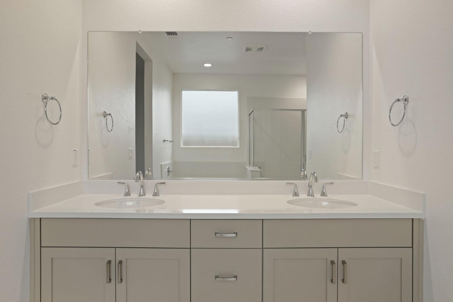 2182 Silk Avenue Manteca, CA 95337 - Photo 18 of 29 Primary bath with dual vanity sinks