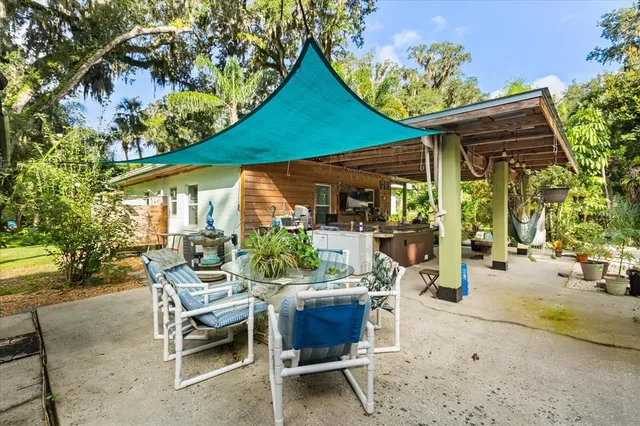 a kitchen with granite countertop stainless steel appliances and wooden cabinets