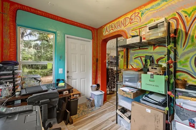 a bedroom with a bed and a couch