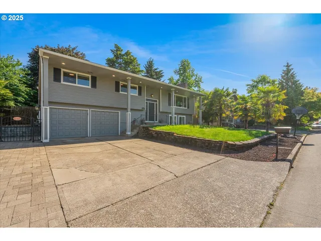 a view of a backyard with a patio