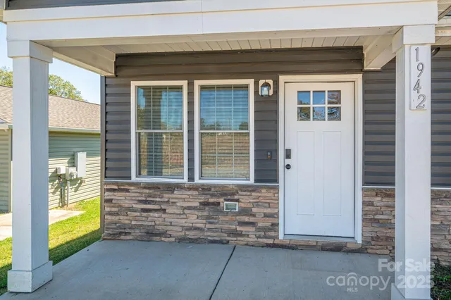 a front view of a house with a outdoor space