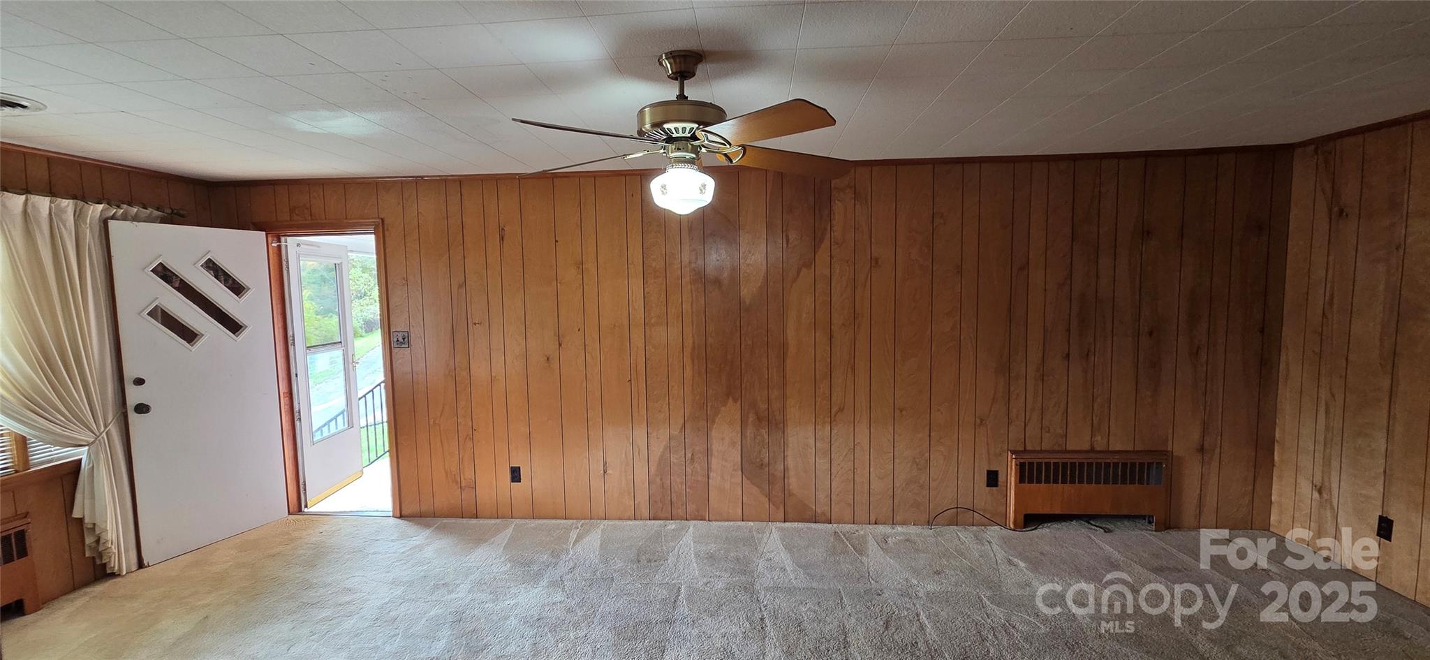 214 Old Dale Road Spruce Pine, NC 28777 - Photo 22 of 42 a view of livingroom with furniture and chandelier fan