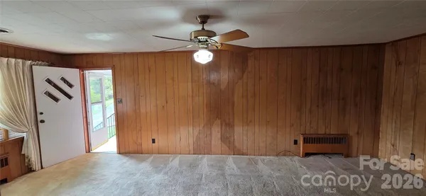 a kitchen with a refrigerator and a stove