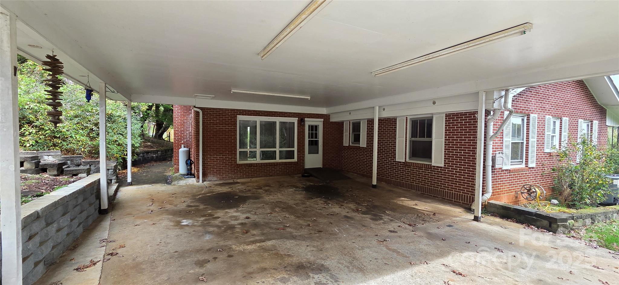 214 Old Dale Road Spruce Pine, NC 28777 - Photo 3 of 42 a view of a porch with seating space