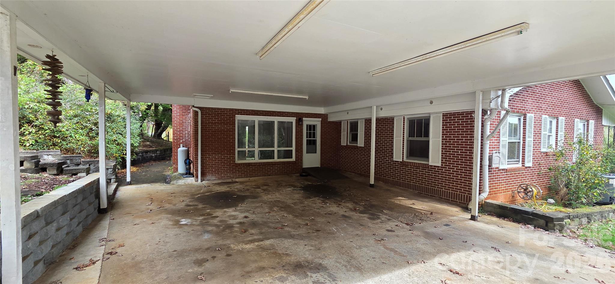 214 Old Dale Road Spruce Pine, NC 28777 - Photo 3 of 39 a view of a porch with seating space