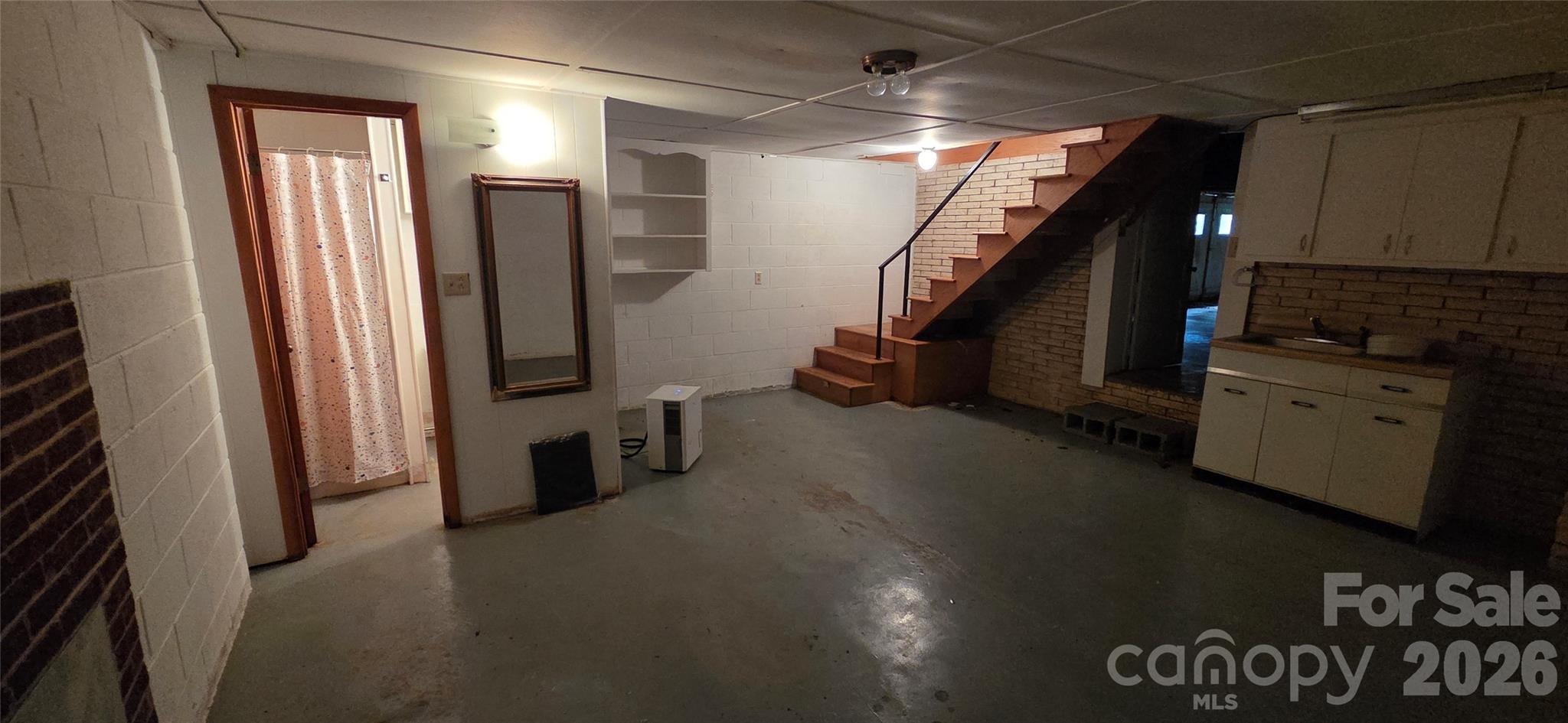 214 Old Dale Road Spruce Pine, NC 28777 - Photo 32 of 39 a view of a hallway with stairs
