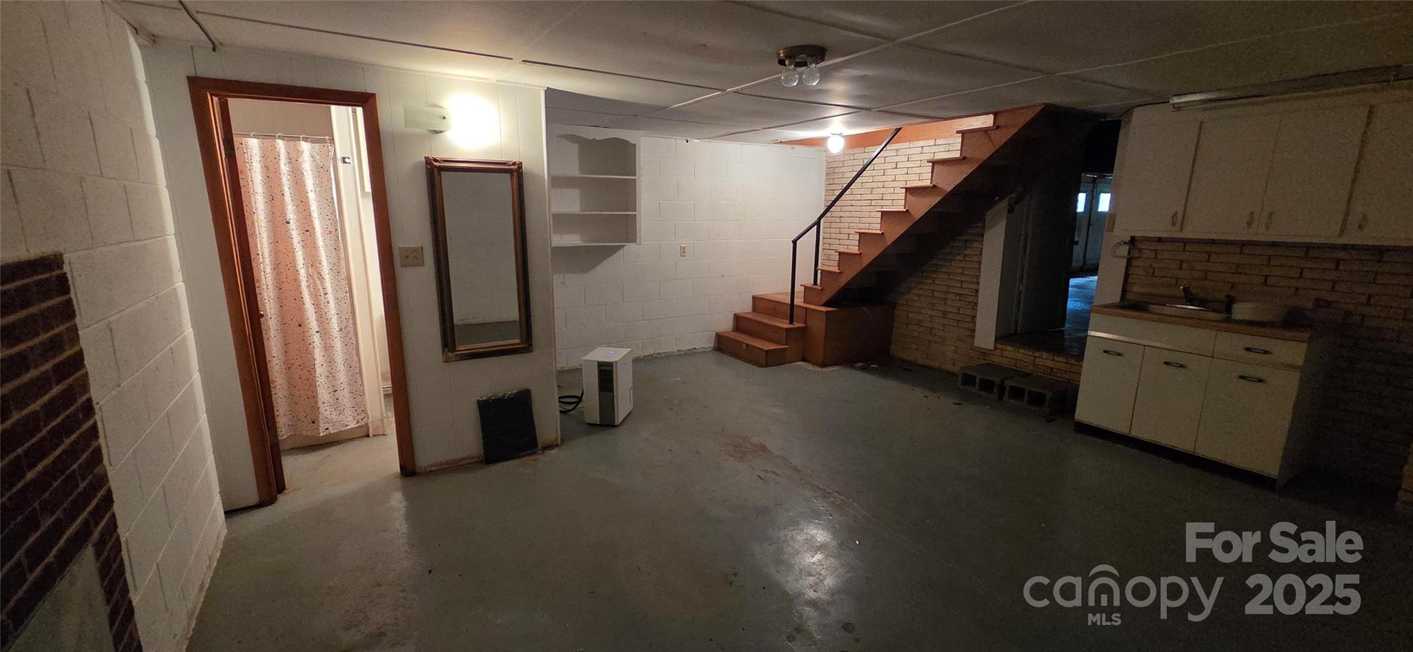 214 Old Dale Road Spruce Pine, NC 28777 - Photo 32 of 42 a view of a hallway with stairs