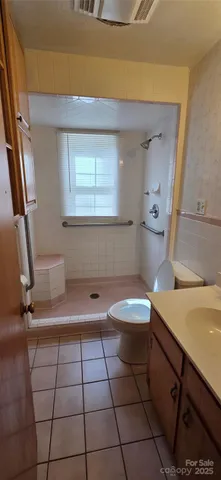a bathroom with a sink and a washing machine