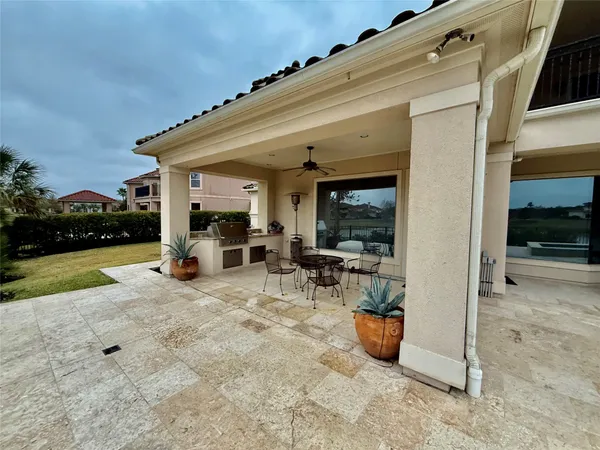a view of a porch with seating space