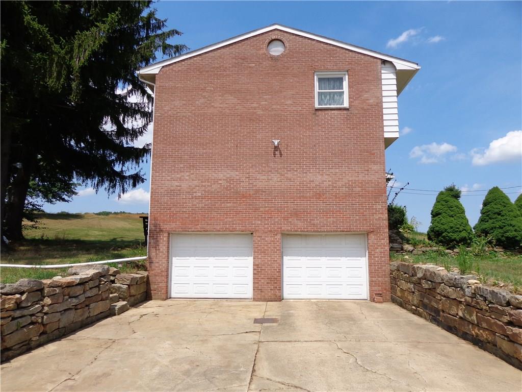 723 Winfield Road Cabot, PA 16023 - Photo 4 of 19 SIDE VIEW GARAGE