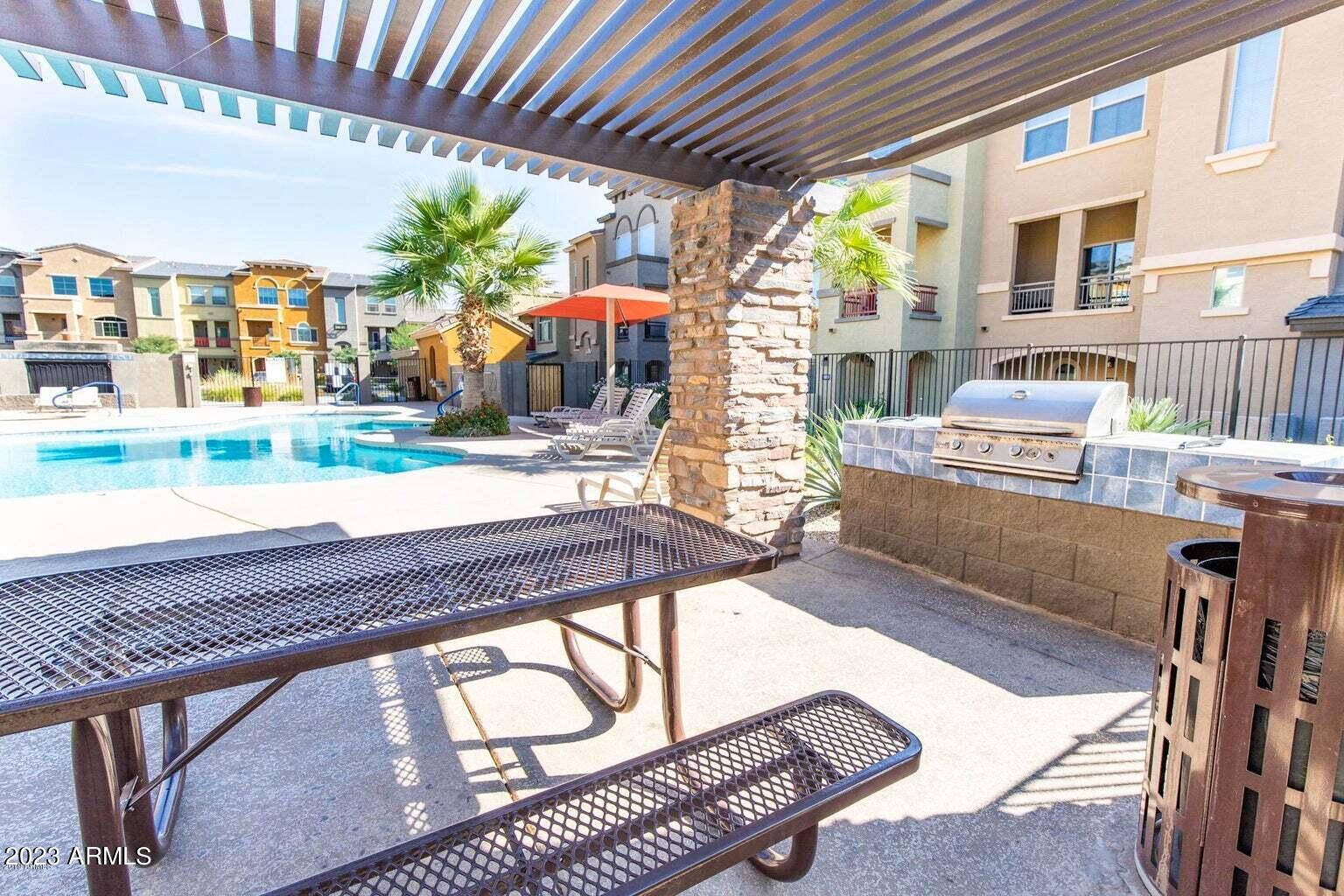 2150 West Alameda Road, Unit 2229 Phoenix, AZ 85085 - Photo 36 of 37 Community Tables and Grill Areas