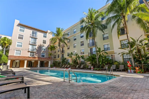 a view of a swimming pool with a patio