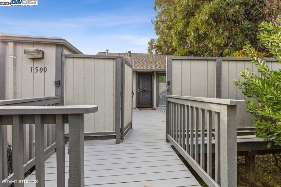 1500 Ashwood Drive Martinez, CA 94553 - Photo 1 of 1 a view of a wooden house with a window and wooden fence