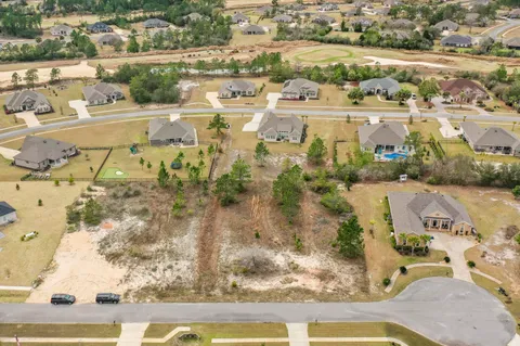 a view of a swimming pool with a lake view