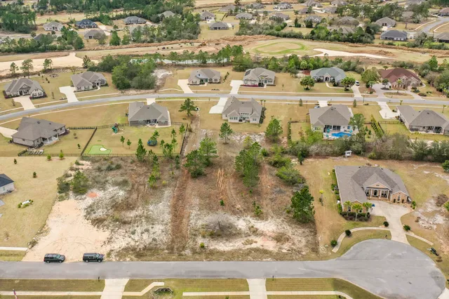 a view of a swimming pool with a lake view