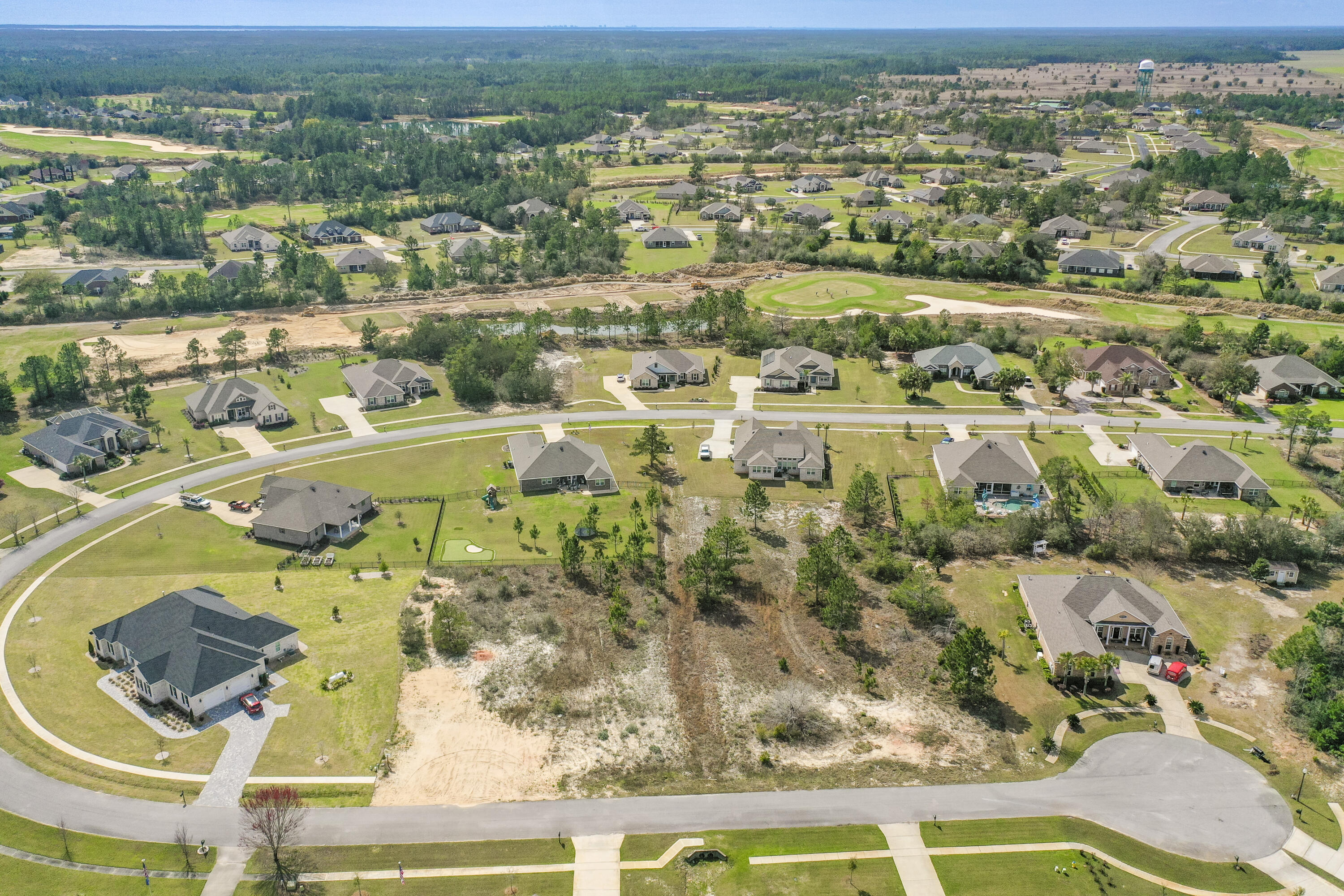 379 Fairway Crossing Freeport, FL 32439 - Photo 3 of 32 an aerial view of residential houses with outdoor space