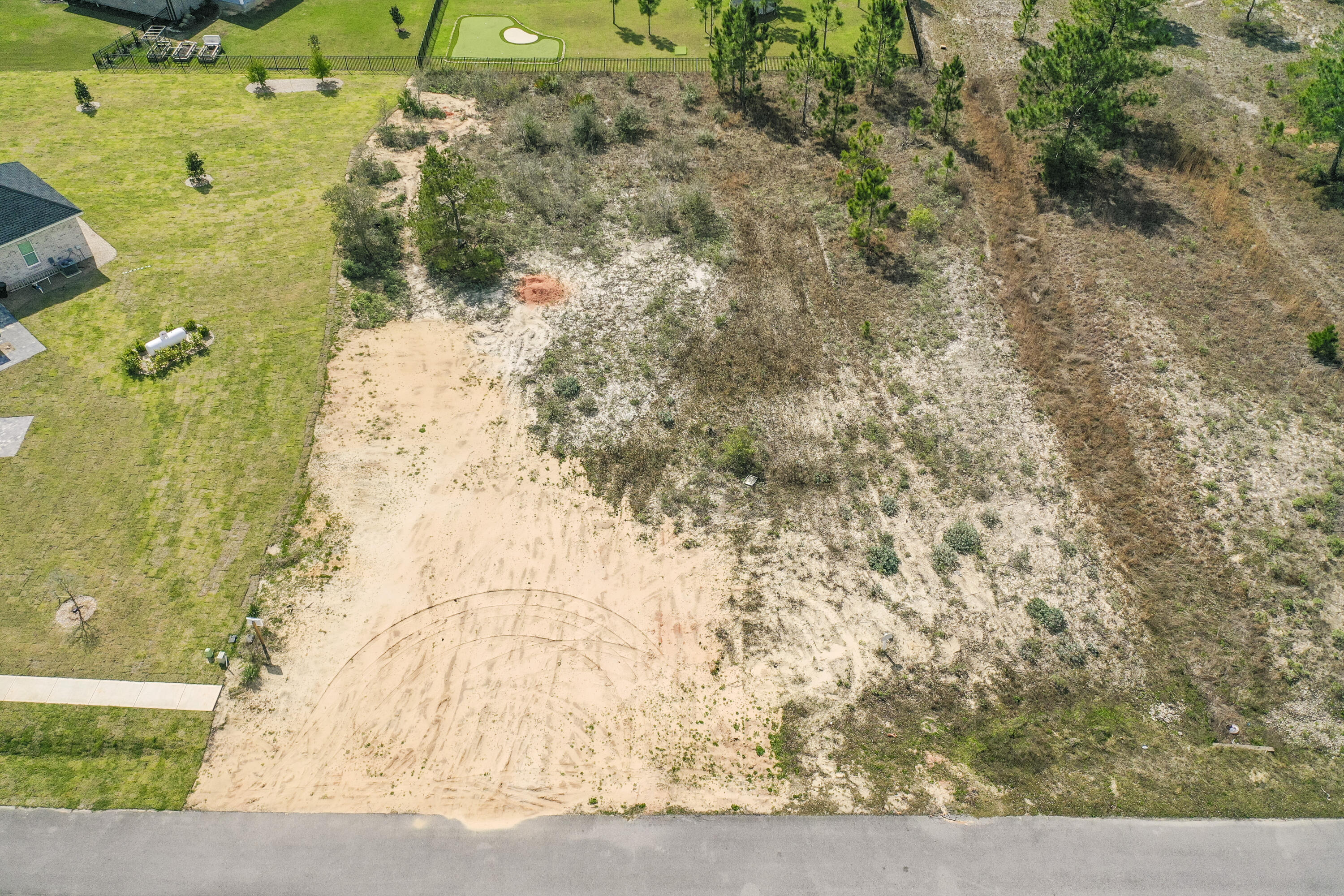 379 Fairway Crossing Freeport, FL 32439 - Photo 8 of 32 a view of a garden with a pathway