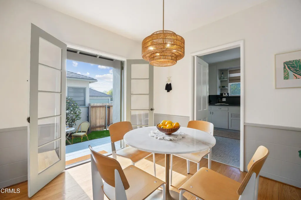 1766 Whitefield Road Pasadena, CA 91104 - Photo 18 of 52 a view of a dining room with furniture and wooden floor