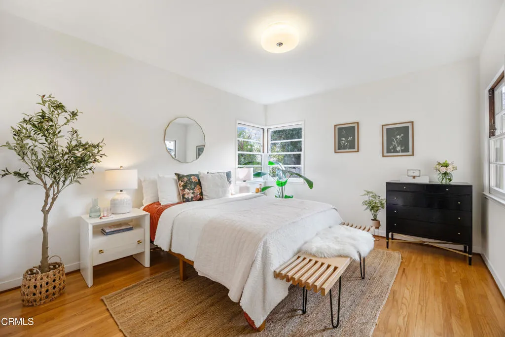 1766 Whitefield Road Pasadena, CA 91104 - Photo 31 of 52 a bedroom with a bed and a table