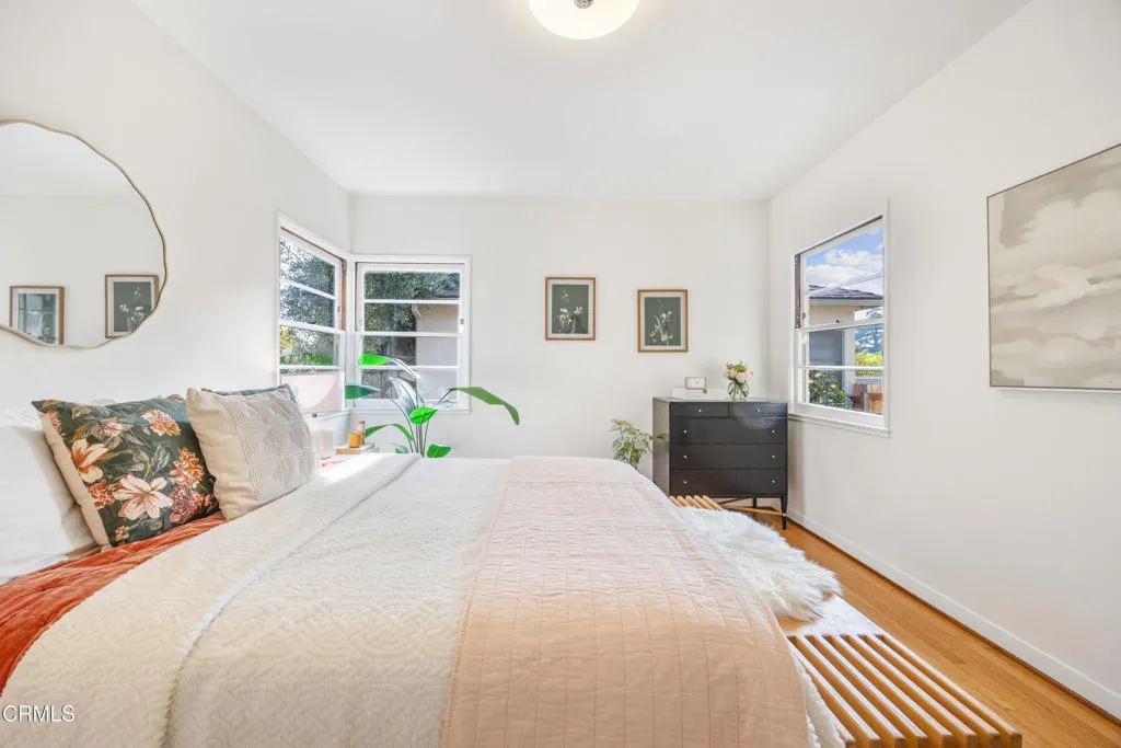 1766 Whitefield Road Pasadena, CA 91104 - Photo 32 of 52 a bedroom with a large bed and a window