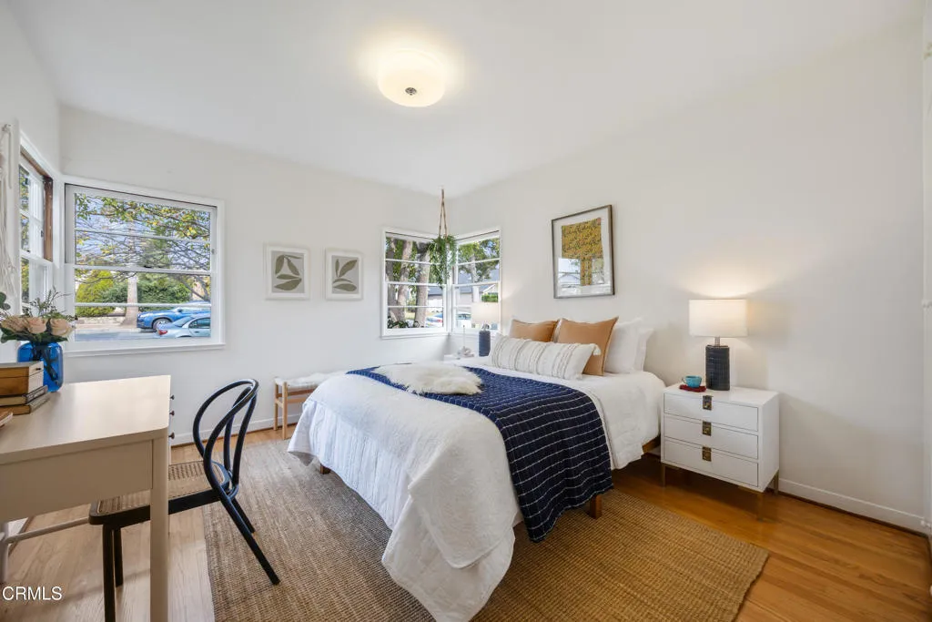 1766 Whitefield Road Pasadena, CA 91104 - Photo 40 of 52 a bed room with a bed and a table