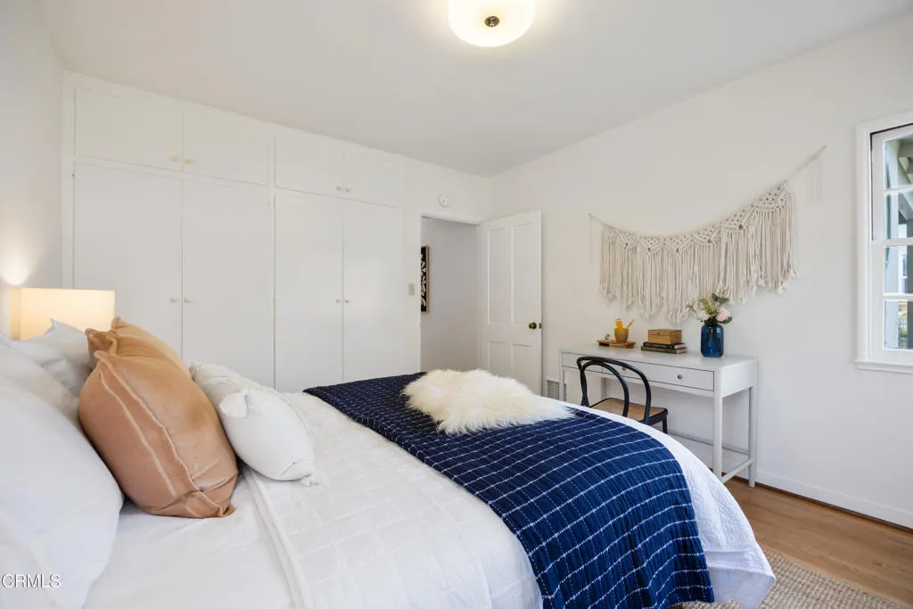 1766 Whitefield Road Pasadena, CA 91104 - Photo 43 of 52 a bedroom with a bed and a table chair
