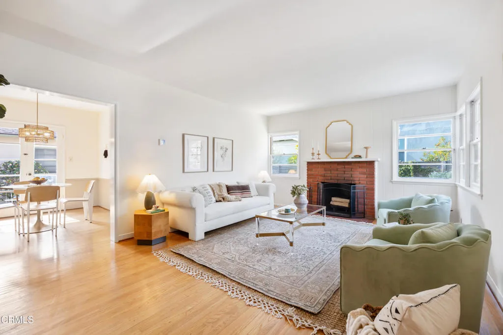 1766 Whitefield Road Pasadena, CA 91104 - Photo 8 of 52 a living room with furniture and a fireplace