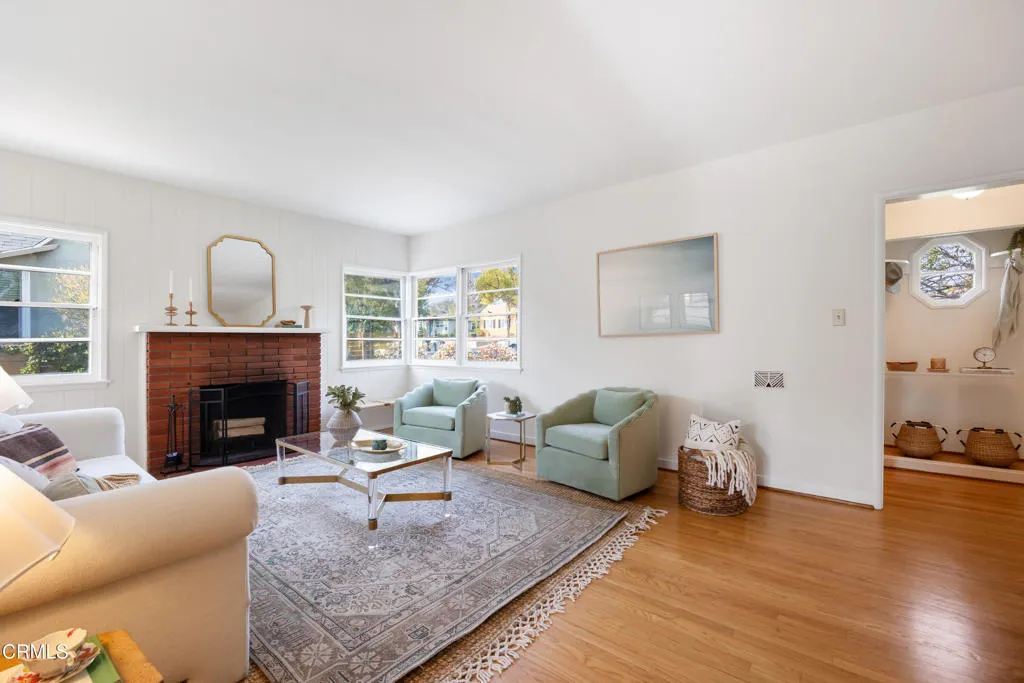 1766 Whitefield Road Pasadena, CA 91104 - Photo 10 of 52 a living room with furniture and a fireplace