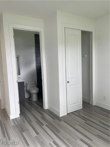 a view of a bathroom from a hallway