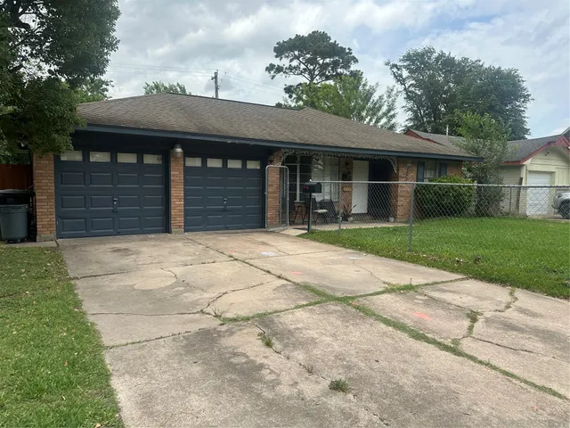 a front view of a house with a garage