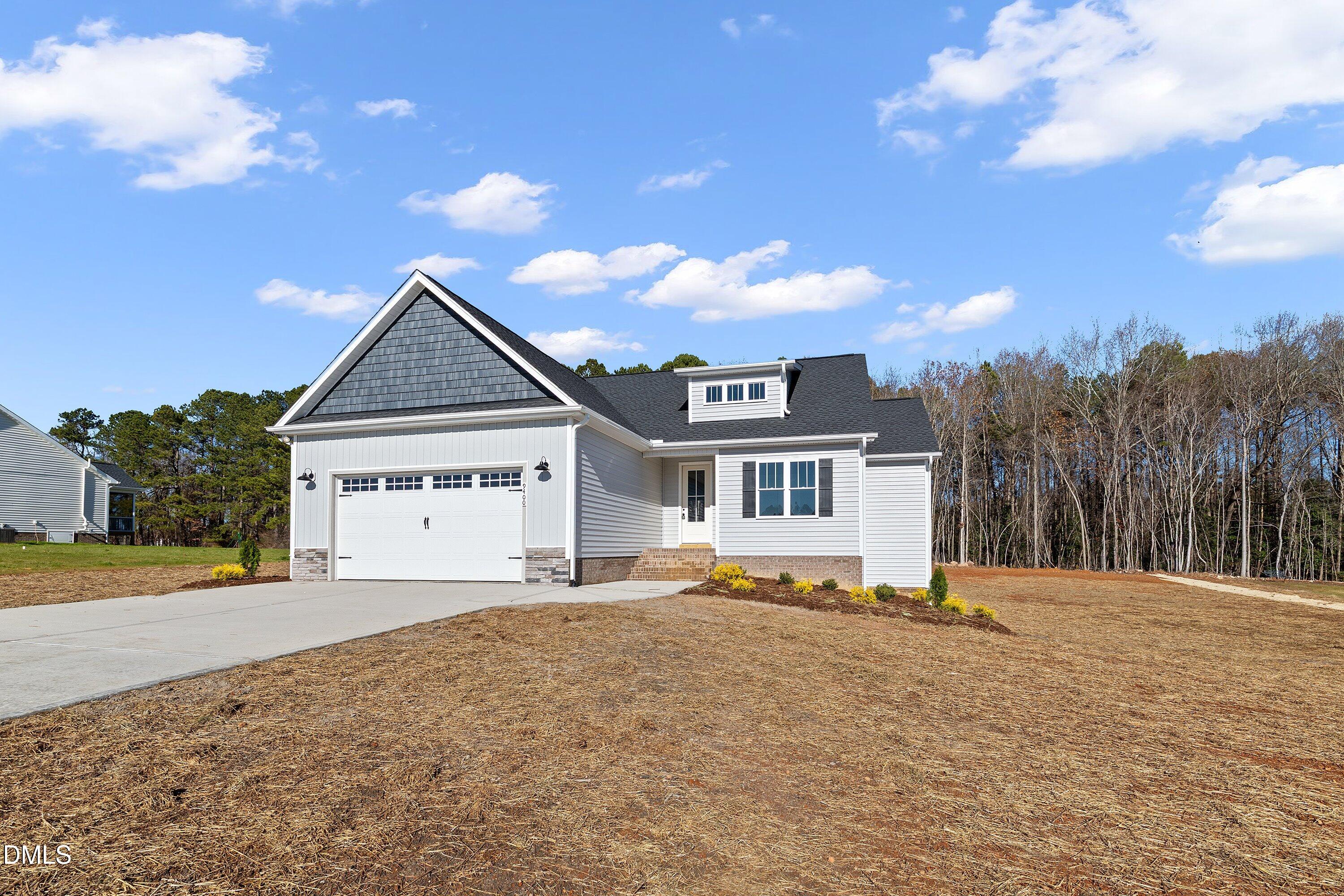 9400 Turkey Way Middlesex, NC 27557 - Photo 1 of 31 a front view of a house with a yard