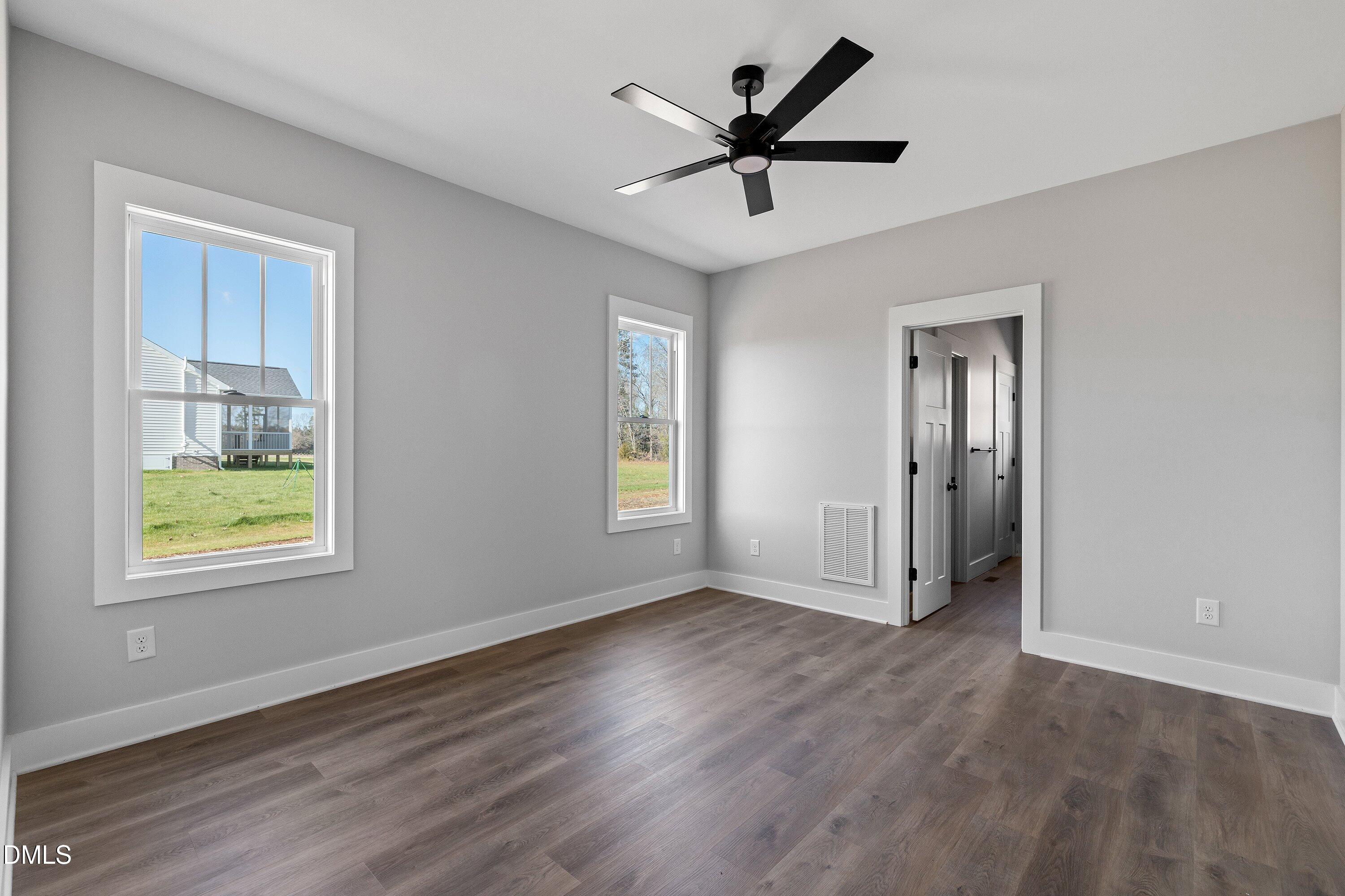 9400 Turkey Way Middlesex, NC 27557 - Photo 13 of 31 a view of a livingroom with a ceiling fan and window