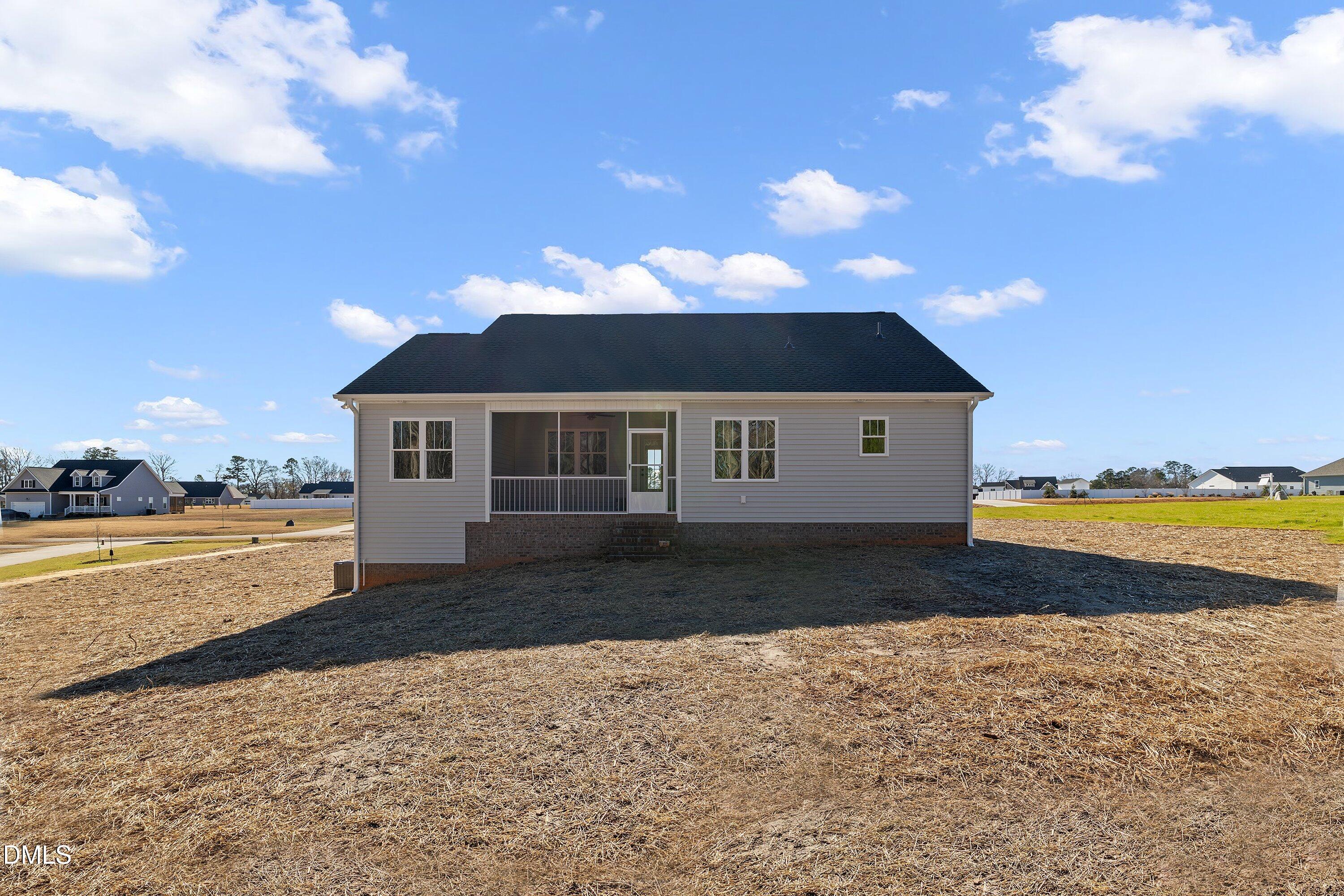 9400 Turkey Way Middlesex, NC 27557 - Photo 26 of 31 a front view of a house with a yard