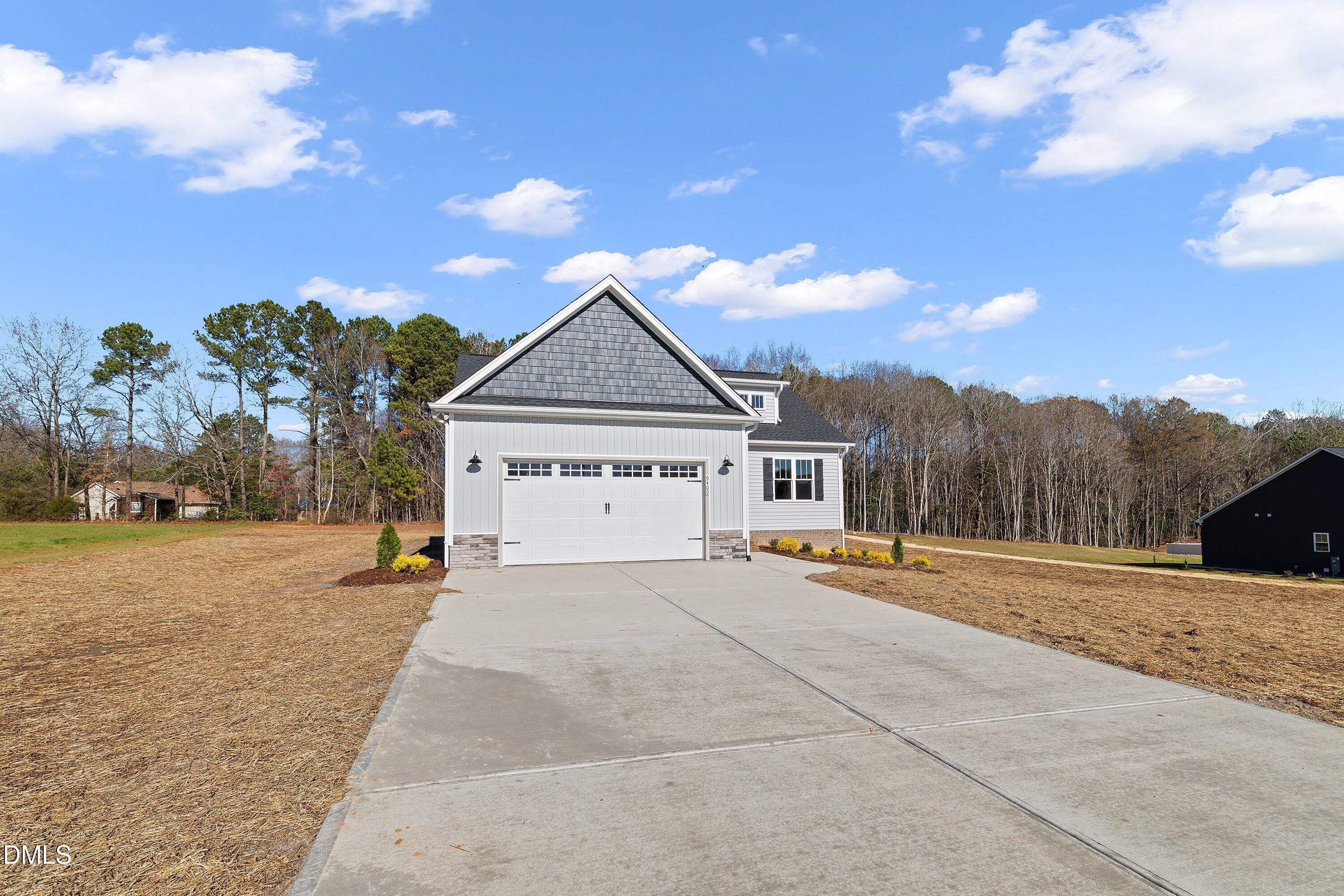 9400 Turkey Way Middlesex, NC 27557 - Photo 29 of 31 a view of house with outdoor space and parking