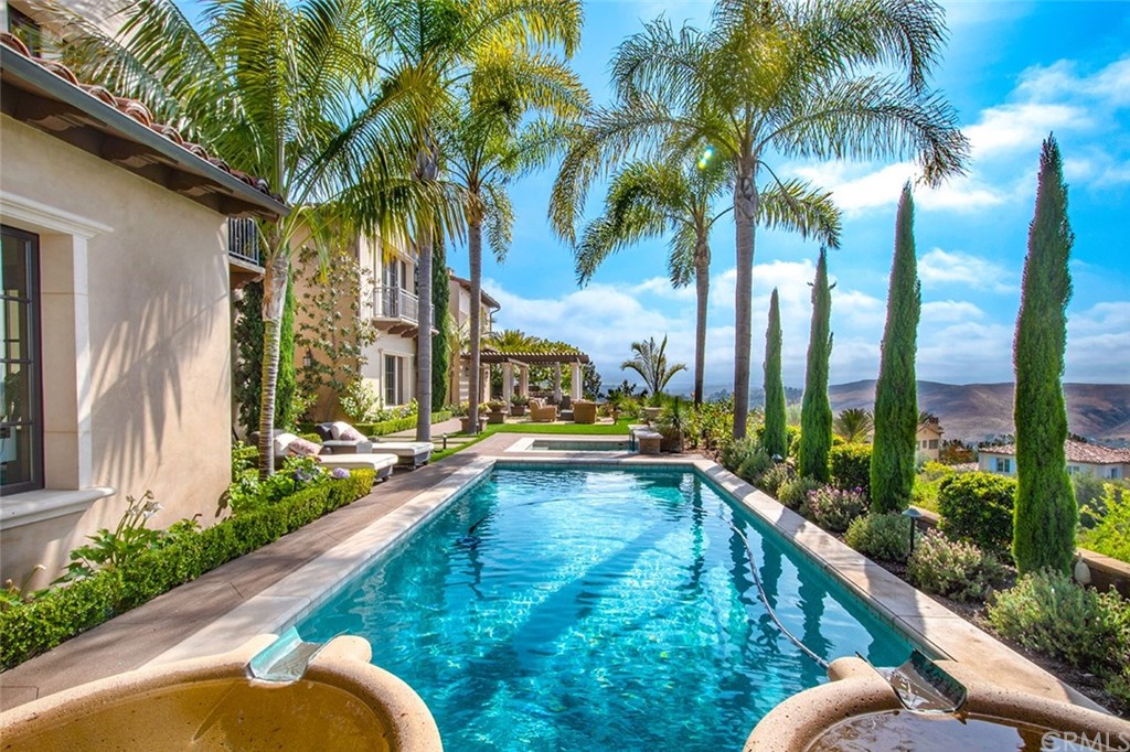 1 Thomas Road Ladera Ranch, CA 92694 - Photo 2 of 25 a view of swimming pool with chairs