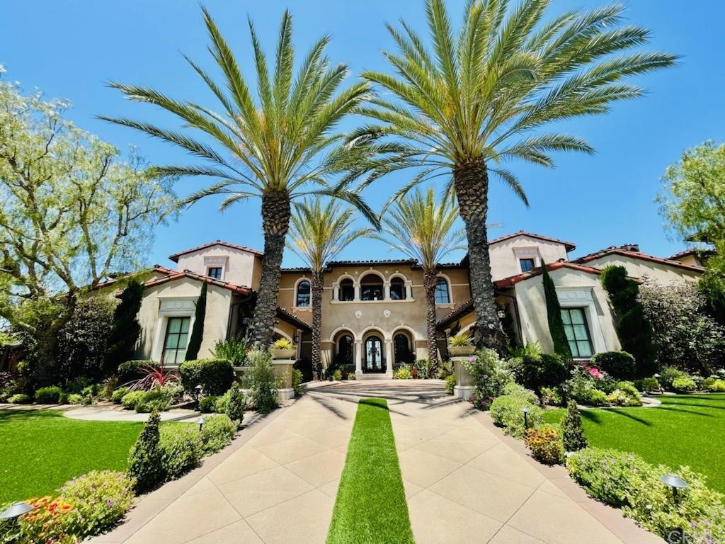 1 Thomas Road Ladera Ranch, CA 92694 - Photo 23 of 25 a front view of house with a garden