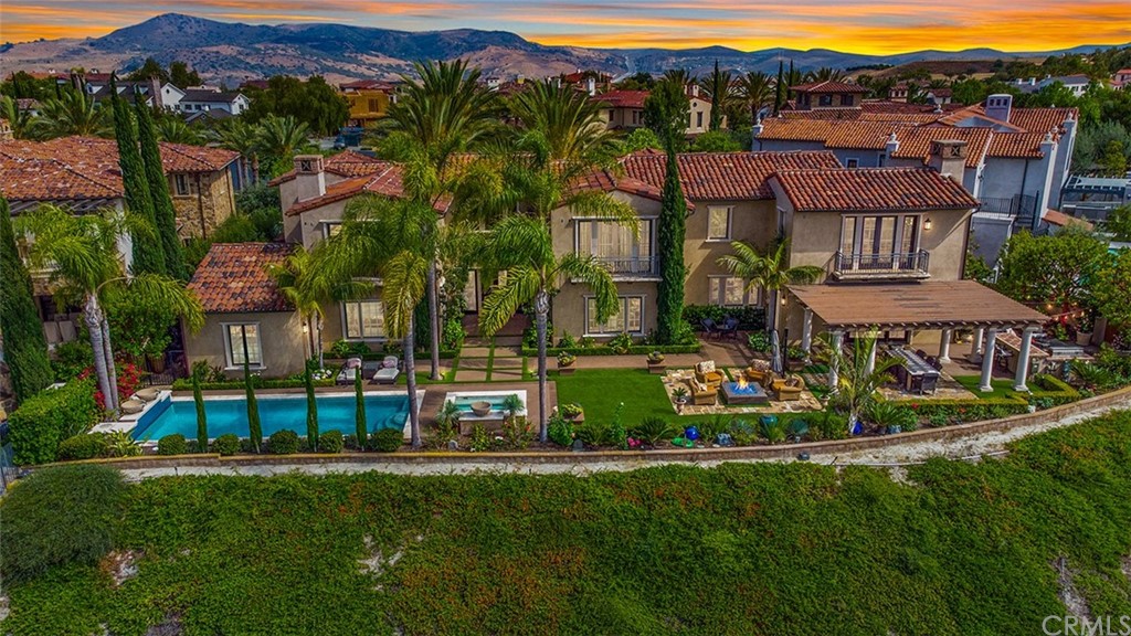 1 Thomas Road Ladera Ranch, CA 92694 - Photo 25 of 25 a view of a house with a big yard and potted plants