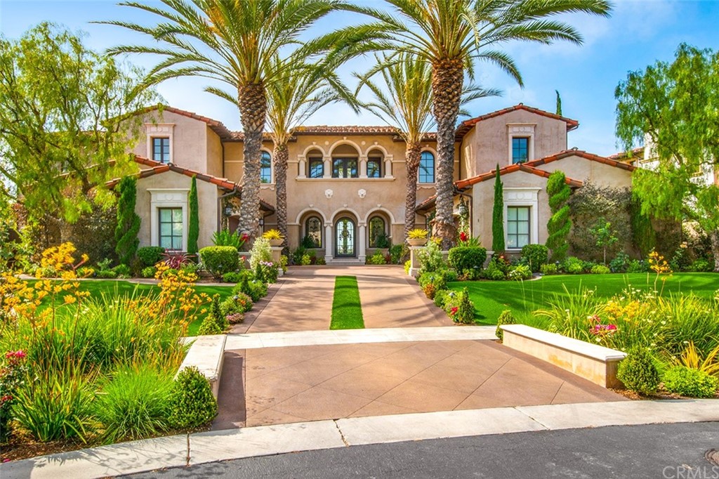 1 Thomas Road Ladera Ranch, CA 92694 - Photo 3 of 25 a front view of a residential houses with yard and green space