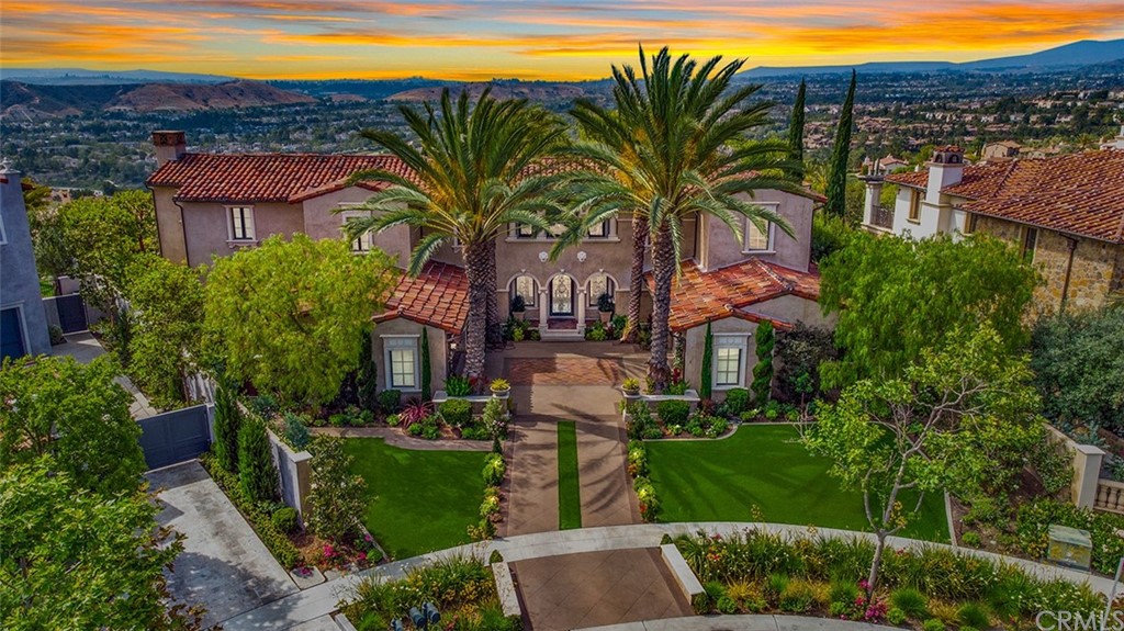 1 Thomas Road Ladera Ranch, CA 92694 - Photo 5 of 25 a front view of a house with a garden