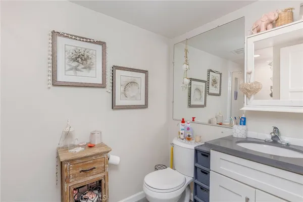 a bathroom with a shower and a sink